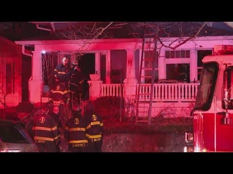 Woman and man rescued from roof during house fire on Indy's near south side