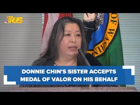 Donnie Chin's sister accepts Medal of Valor on his behalf
