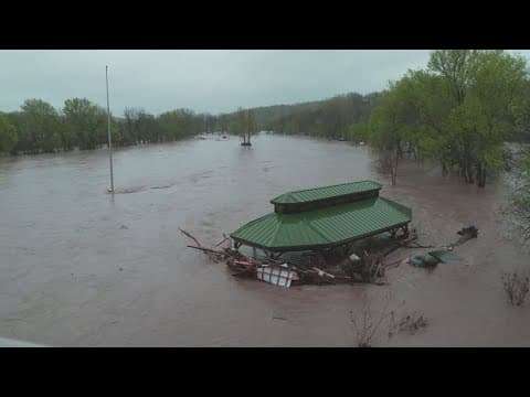 Catastrophic flooding hits Arkansas, residents attempt to save treasured belongings