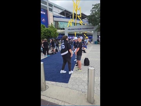 Fans line up outside of Benchmark International Arena for Tampa Bay Lighting home opener