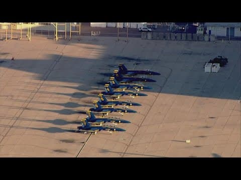 Chopper 8 flies over MCAS Miramar a day before the big show as planes get ready for take off