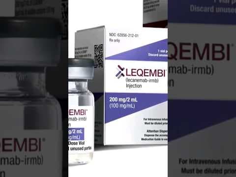 La woman discusses new Alzheimer's drug with lawmakers