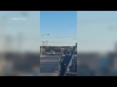 A derailed train crashes into a building, killing one person