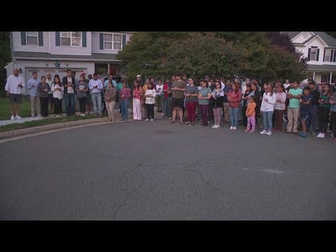 Community holds a vigil outside Mamta Kafle Bhatt's home, hours after her husband's arrest