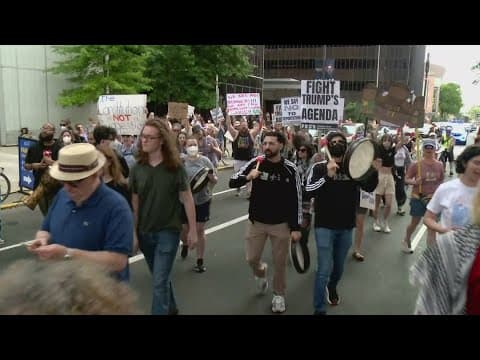 Rally outside New Orleans ICE office draws over 100