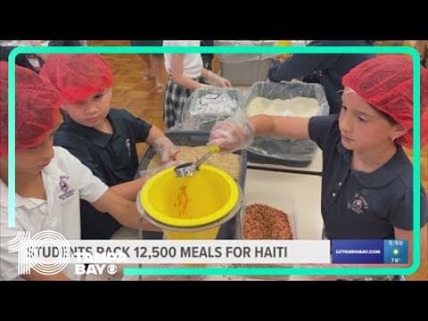 Elementary school students pack thousands of meals for Haiti