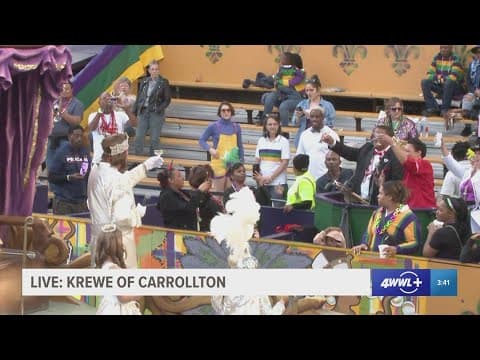 King of Krewe of Carrollton toasts with Mayor Cantrell and accepts key to the city