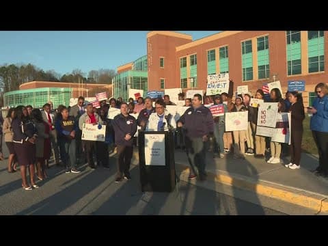 Teachers, staff, and students protest cuts to the Education Department