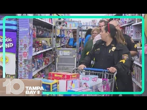 Hillsborough County school resource officers play Santa by toy shopping for students