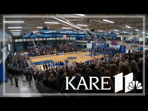High school basketball fans pack the stands at Wayzata-Hopkins matchup