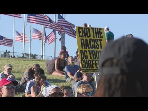 Go-Go protesters march against surge