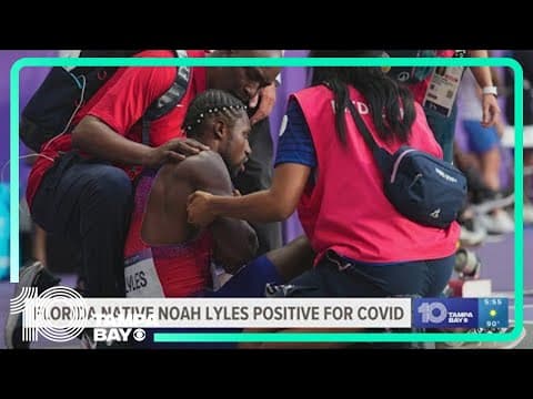 Medics tend to Noah Lyles, cart him away from track after men's 200 final