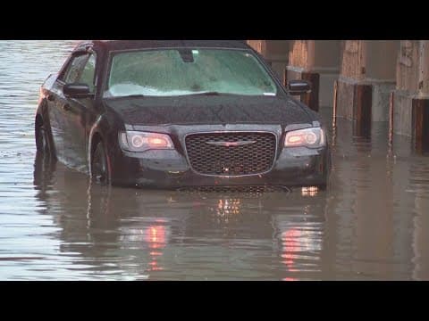Heavy rain floods streets around Indianapolis