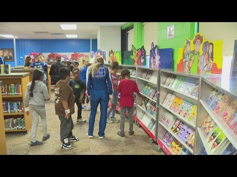 Colts connect hundreds of Indianapolis kids with free books at community book fair