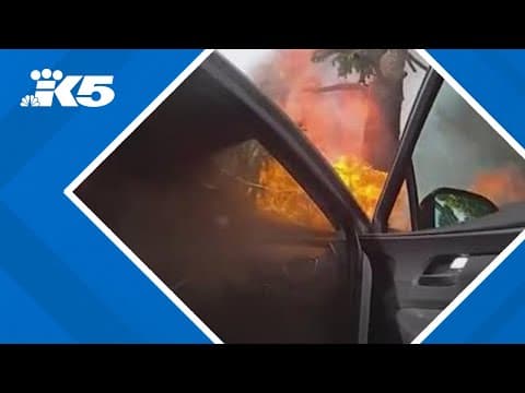 Police pull man from burning car in Tacoma