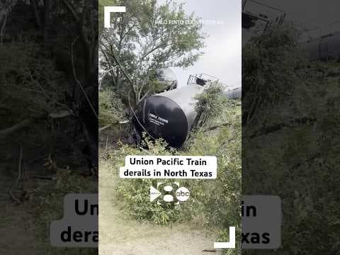 Almost 3 dozen cars toppled off the track & sparks from the derailment caused a brushfire in Gordon.