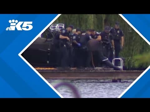BREAKING: Seattle police fish suspect out of water after he flees following firing at officers