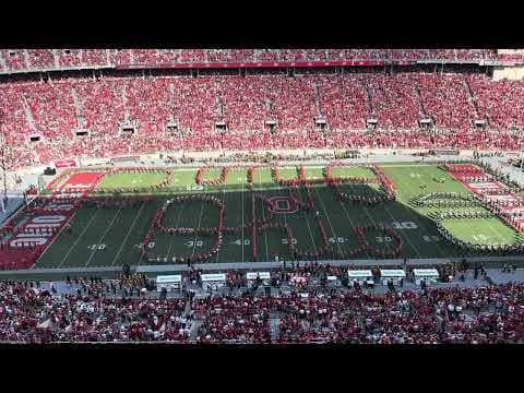 Alumni join Ohio State University Marching Band for quadruple Script Ohio