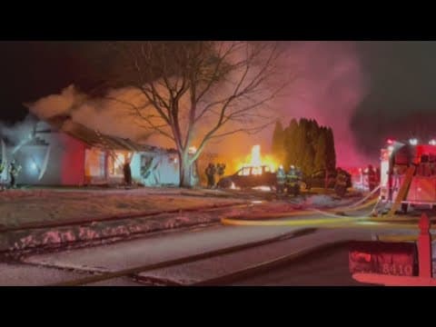 Firefighters battle house fire on Indy's south side