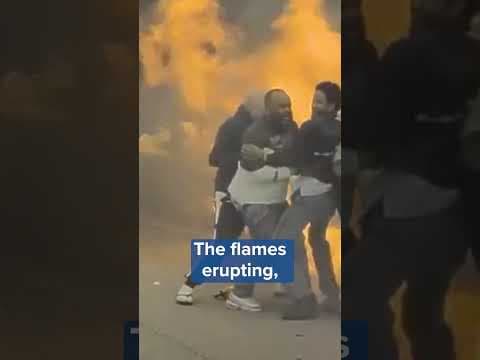 WHOA: A team of Good Samaritans banded together on I-94 in St. Paul to rescue a trapped driver.