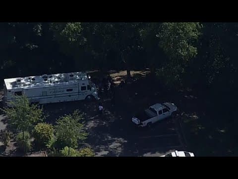 WATCH: Police appear to be searching wooded area in Manassas Park