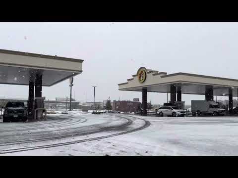 Snow coming down at Bucee’s in Denton, Texas