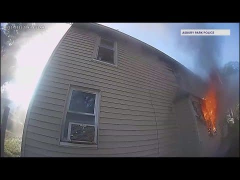 Caught on camera: Cops rescue kid from second story of burning home in New Jersey