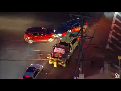 MDOT tow truck smashes through police and civilian cars