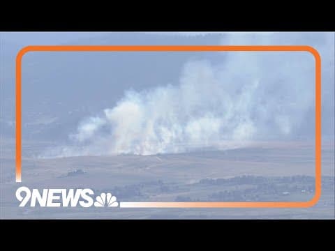 Brush fire burning near Roxborough