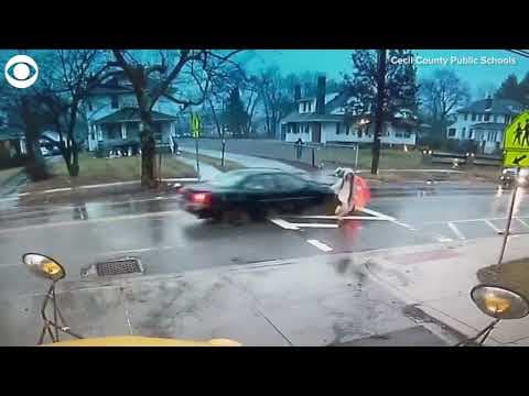 Maryland police officer pushes student out of the way of oncoming car