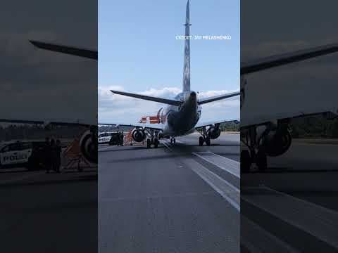 Passenger who made 'direct threat' aboard plane at SEA Airport taken into custody #king5 #seattle