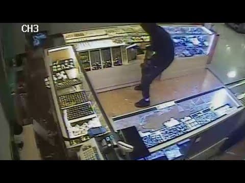 New surveillance video shows masked men smash jewelry cases at Houston-area H-E-B