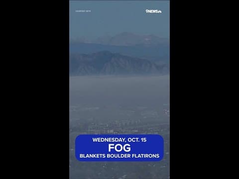 Boulder Flatirons bathed in morning fog
