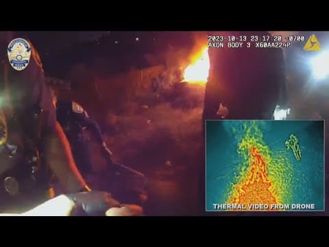Body cam video shows police rescue man from car fire