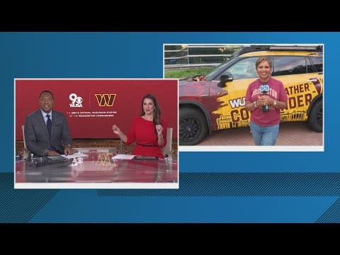 Allison Seymour officiates cornhole game between Commanders fans and Giants fans