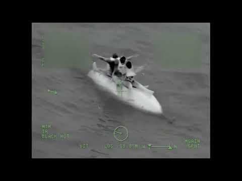 Coast Guard crews rescue 3 boaters stuck at sea for 9 hours after their boat capsizes