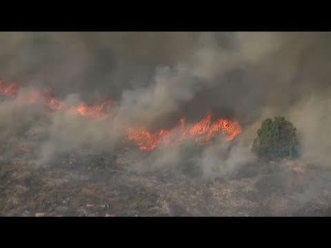 Fire crews battle brush fire in San Diego along SR-78