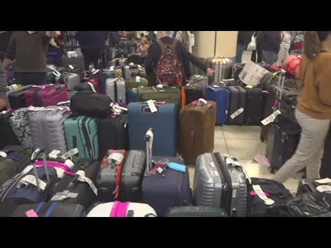 Bags everywhere! Luggage from canceled flights in San Diego piles up