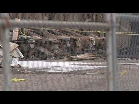 Multiple vehicles, garages damaged in fire at Columbus apartment building