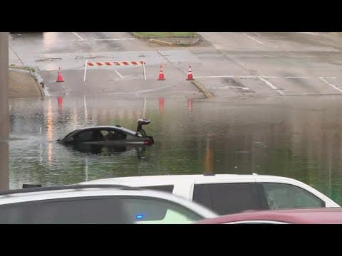 Houston drivers stranded when storm causes street flooding
