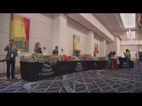 Conference attendees packed meals to feed families