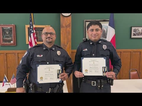 Angleton police officers save woman from burning car