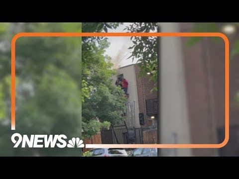Neighbor steps in to help people inside burning building in Denver