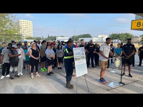Dozens of volunteers help with street cleanup around the Bissonnet Track