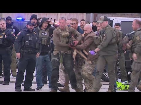 Police dog shot after finding man accused of killing deputy, authorities say