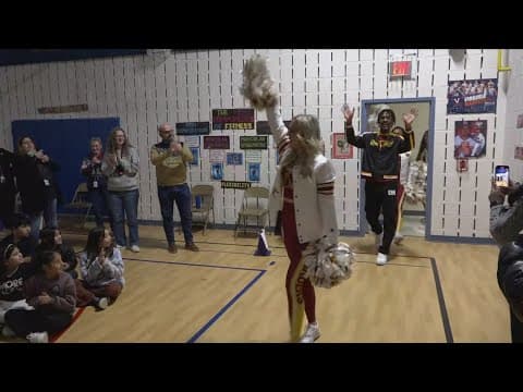 Commanders visit Herndon elementary school to meet students pumped for the playoffs
