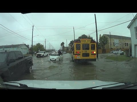 High water strands some drivers in Galveston during Thursday's rain
