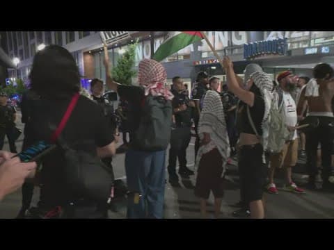 Protestors face off police outside of the Watergate Hotel as Israeli Prime Minister visits DC