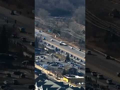 Vehicles stretched for miles in the procession route for 3 emergency responders killed on Feb. 18.