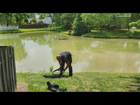 Driver rescued from car sinking in Lebanon retention pond